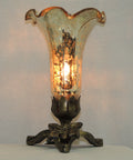 Vintage style lily mercury gold glass table lamp with warm glow, ornate antique bronze finished base with sculpted legs and butterfly resting on base.