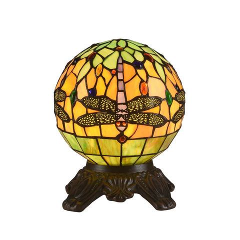 Dragonfly globe green orange memory lamp illuminated.